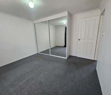 MODERN TWO BEDROOM APARTMENT IN A GATED COMMMUNITY - Photo 2