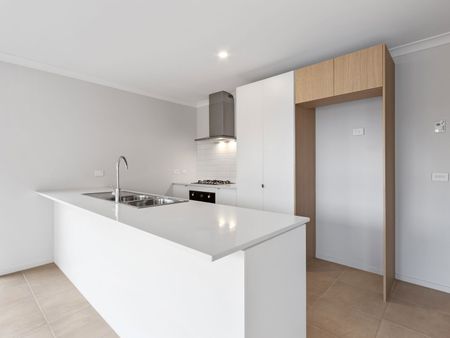 “Spacious 4 Bedroom Family Tarneit Home in the well sought after Stadio United Estate" - Photo 4