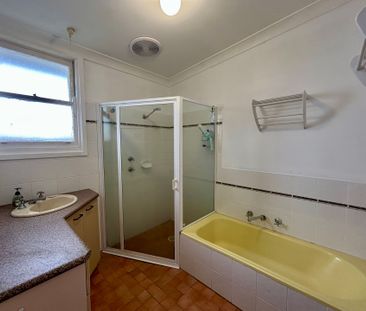 FRESHLY UPDATED HOME IN A FAMILY-FRIENDLY LOCATION - Photo 4