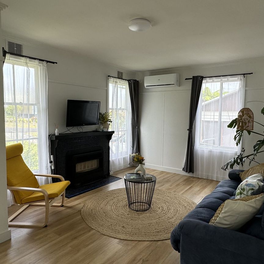 Fully Furnished Cozy Town Delight - Photo 1