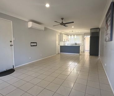 GORGEOUS PRIVATE GROUND FLOOR UNIT WITH SEA BREEZES! - Photo 1