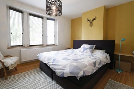 Gezellige woning met 3 slaapkamers en charmante tuin te Beveren! - Foto 5