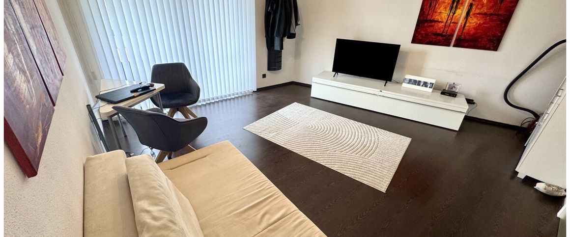 Stilvolles, renoviertes und möbliertes Apartment mit Balkon und TG-Stellplatz in beliebter Lage - Foto 1