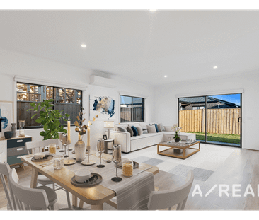 Modern 4-Bedroom Family Home in Weir Views - Photo 1