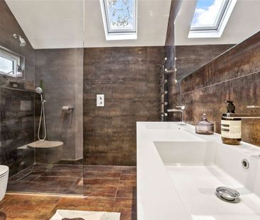 Fabulous family home on a beautiful tree-lined road in the heart of... - Photo 3