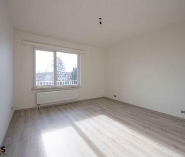 Gerenoveerd appartement met garagebox. - Photo 4