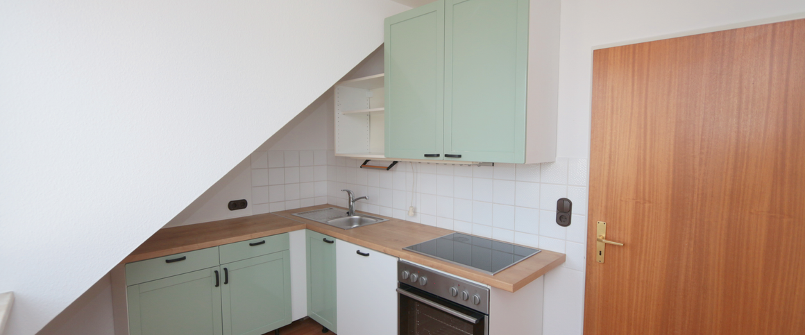 Schicke Dachgeschosswohnung in zentraler Lage - Photo 1