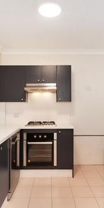 OVERSIZED THREE BEDROOM WITH PARKING! - Photo 3