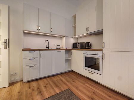 Małe, dwupokojowe w centrum, ul. Topolowa 30 m² - Photo 5