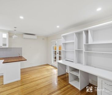 Stylish Renovated Home Offering Comfort and Space - Photo 4