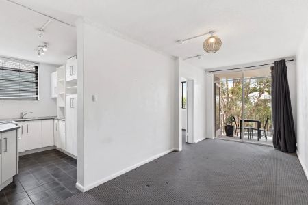 Peacefully positioned two bedroom plus sunroom apartment. - Photo 4