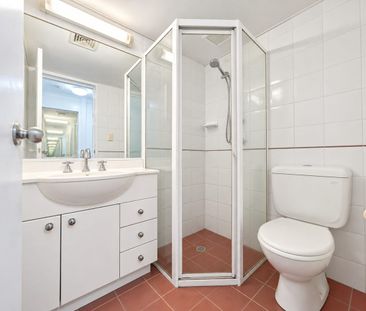 Aircon in both bedrooms and tiled floor throughout the living!!! - Photo 3