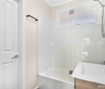 Conveniently positioned modern two bedroom unit with lock up garage - Photo 2