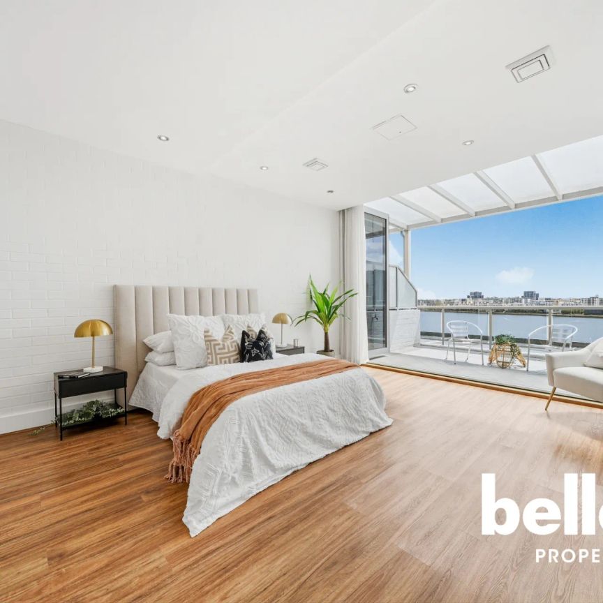 Panoramic Water Views | Tri- level Living | Beautiful Flooring | - Photo 1