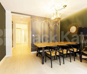 Stunning 3 bed 2 bath house split over 3 floors with a patio area. - Photo 2