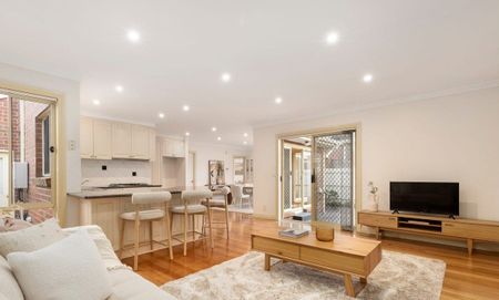 Designed for Family Living in the McKinnon School Zone! - Photo 2