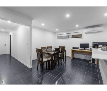 Modern Family Living with Separate Media Room - Photo 3