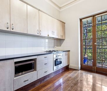 Top-Floor Living with Park Views & Incredible Convenience - Photo 6