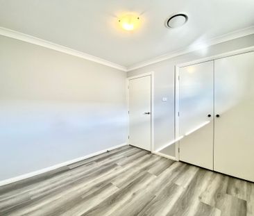 Elegant Family Living in Prestigious Oran Park! - Photo 1