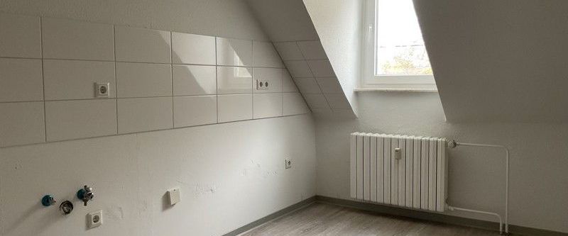 Gemütliche Dachgeschoss Wohnung! - Foto 1