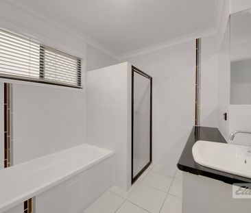 NEAT LOW MAINTENANCE 3 BEDROOM HOME WITH LOCK UP GARAGE - Photo 4