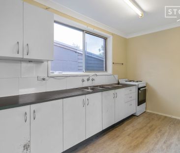 Two-bedroom unit in a central location. - Photo 4