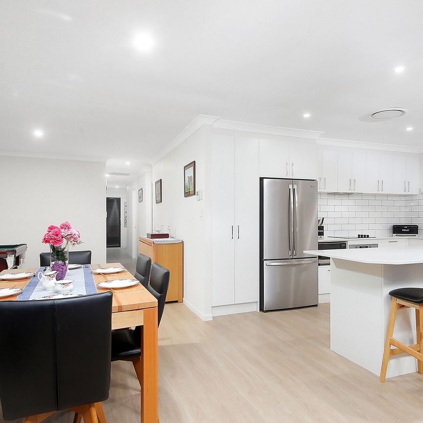 Welcome Home to Modern Elegance: A Newly Renovated 4-Bedroom Haven - Photo 1