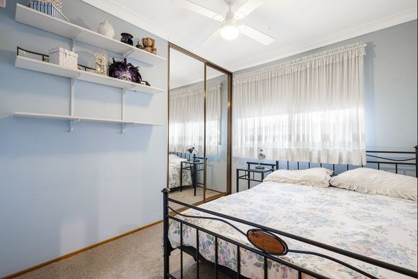 Spacious Family Home In Sought After Location! - Photo 1