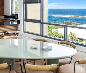 Furnished Coastal Oasis with Panoramic Views and Artistic Flair - Photo 5