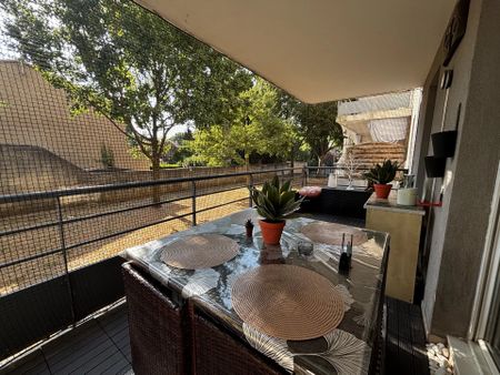 Location Appartement 3 pièces 57m² NIMES 30900 - Photo 3