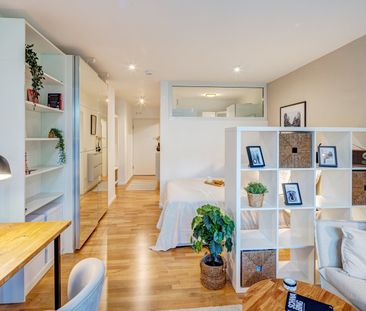Friendly 1-room apartment with balcony - Photo 1