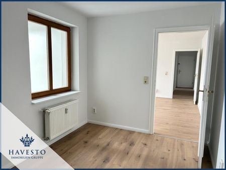 Frisch renovierte 2-Raumwohnung mit Einbauküche & ca. 50 m² Wohnkomfort! - Foto 4