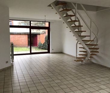 Gezellige rijwoning met 3 slaapkamers, 2 garageboxen en tuin gelege... - Foto 2