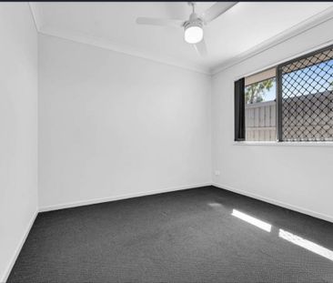 Modern 4-Bed Family Home with Dual Living Spaces in Vibrant Yarrabilba - Photo 5