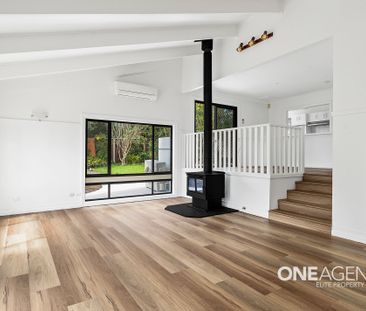 VERSATILE FAMILY LIVING: NEWLY RENOVATED FIVE-BEDROOM HOME WITH SEL... - Photo 1