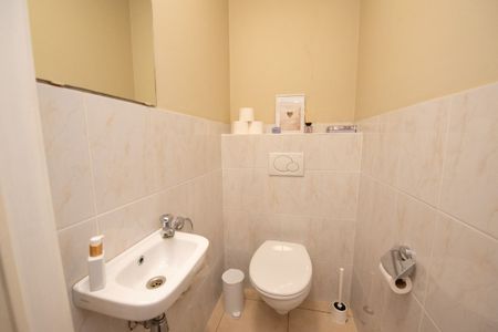 Gelijkvloers appartement in centrum Waregem met tuintje & garage. - Foto 2