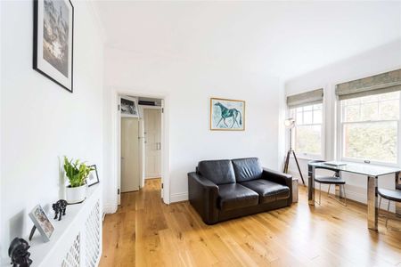 A bright and well-proportioned, one-bedroom apartment, with wooden floors throughout, situated on the top floor of a popular mansion block in Chelsea. - Photo 2