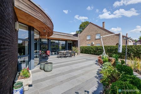 GELIJKVLOERS APPARTEMENT MET TUIN EN TWEE SLAAPKAMERS NABIJ HET STADSCENTRUM VAN BILZEN - Photo 4