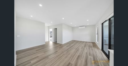 Townhouse with Solar Panels and Park Views! - Photo 2