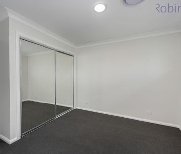 Brand new three bedroom townhouse with ducted air conditioning - Photo 5