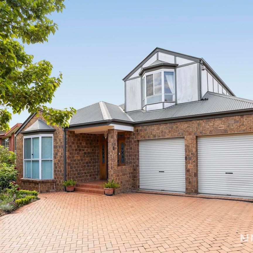 WONDERFUL FAMILY HOME WITH GARDEN MAINTENANCE - Photo 1