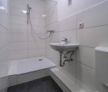 Großzügig geschnittene 1-Zimmer-Wohnung mit Balkon in zentraler Lage - Photo 1