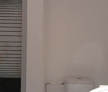 Appartement te huur in Ghlin voor € 595 met 1 slaapkamer - Photo 4