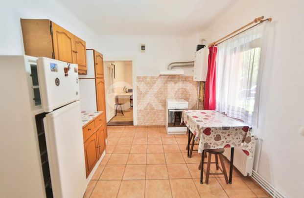 Garsonieră la casă de închiriat,str Lungă - Fotografie 1