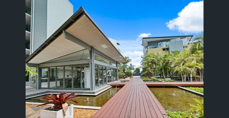 Waterfront Living with Ground-Floor Convenience! - Photo 2