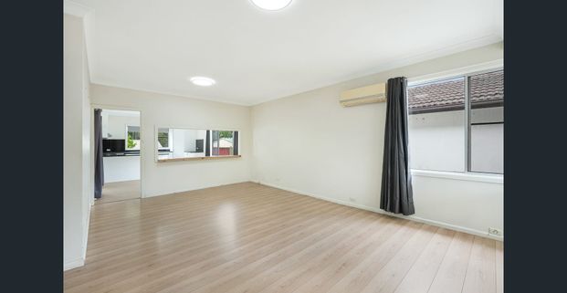 Three Bedroom House in Convenient Location - Photo 1