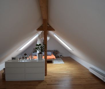 Maisonette-Dachwohnung mit viel Charme - Foto 3