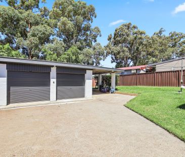 Elegant Family Home with Side Access & Large Garage in Peaceful Cam... - Photo 3