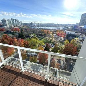 Modern 1 Bedroom + Den Furnished Condo with Large Patio & Ocean View - Photo 2