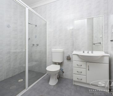 Convenient located 2 bedroom unit - Photo 5